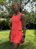SHORTS DUPLO LYCRA E POLIAMIDA TECIDO CANELADO COM BOLSOS LATERAIS PATIMODAFITNESS  Laranja neon