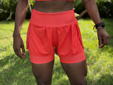 SHORTS DUPLO LYCRA E POLIAMIDA TECIDO CANELADO COM BOLSOS LATERAIS PATIMODAFITNESS  Laranja neon
